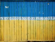 yellow and blue wooden fence