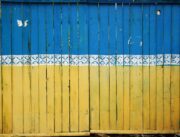 yellow and blue wooden fence